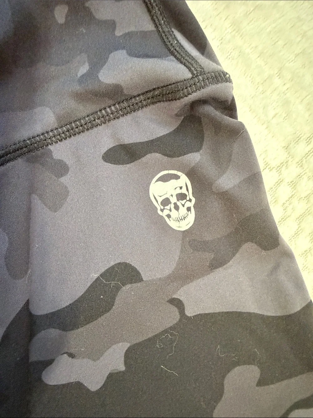 High-Rise Black Camo Bike Shorts with Subtle Skull Accent